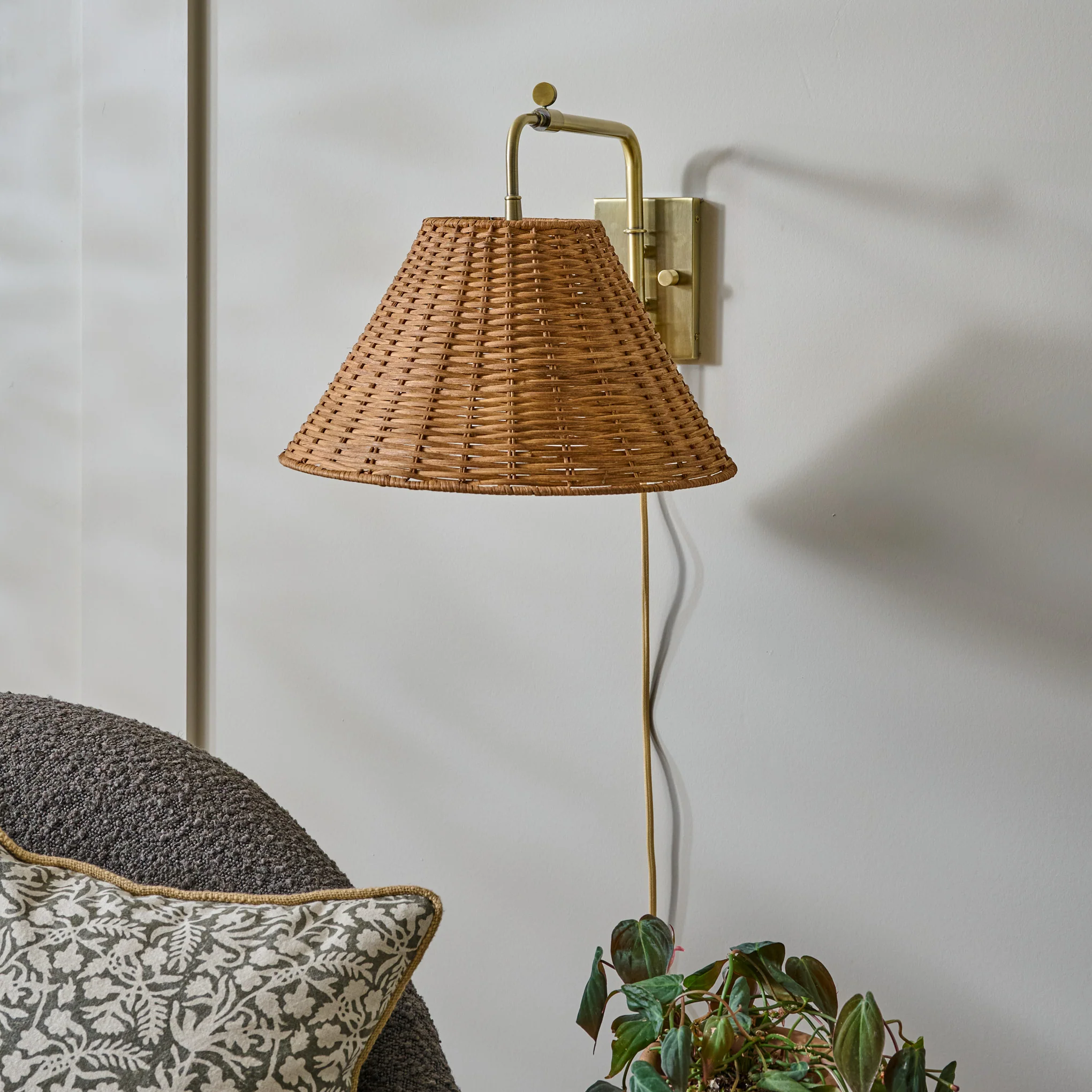 Tapered Rattan Swivel Plug-In Sconce